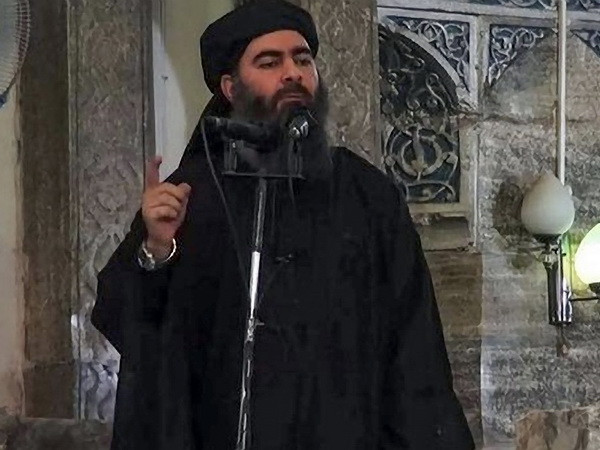 Thủ lĩnh IS Abu Bakr al-Baghdadi. (Nguồn: EPA/TTXVN) Liên quân quốc tế "không thể xác nhận" cái chết của thủ lĩnh IS ảnh 1