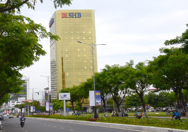 Đà Nẵng: Xử phạt chủ đầu tư 2 tòa cao ốc lắp kính màu vàng phản quang ảnh 1