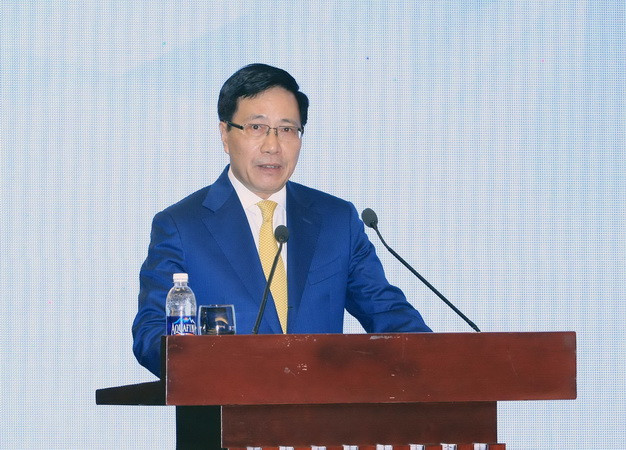 Phó Thủ tướng Phạm Bình Minh phát biểu trong Phiên khai mạc Hội thảo về các ưu tiên của năm APEC 2017 tại Hà Nội. (Ảnh: Phạm Kiên/TTXVN) Việt Nam đã chuẩn bị sẵn sàng cho Năm APEC 2017 ảnh 1