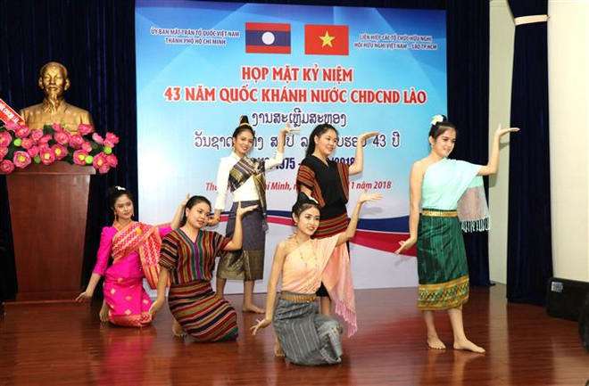 Kỷ niệm Quốc khánh Lào tại Hà Nội và Thành phố Hồ Chí Minh ảnh 1