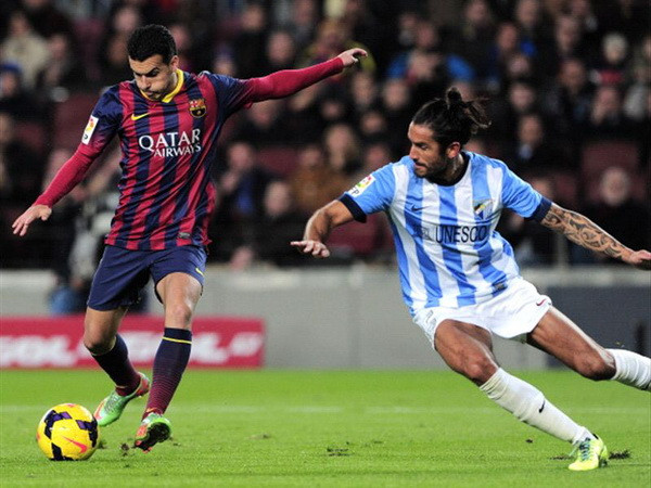 Pedro giúp Barca giành trọn 3 điểm trước Malaga. (Nguồn: AP) HLV Martino: Kinh nghiệm giúp Barca vượt qua "cú sốc" ảnh 2