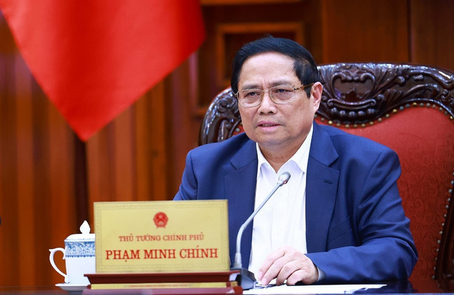 Thủ tướng Phạm Minh Chính chủ trì cuộc họp. (Ảnh: Dương Giang/TTXVN) thu tuong chu tri hop chinh sach tai khoa.jpg