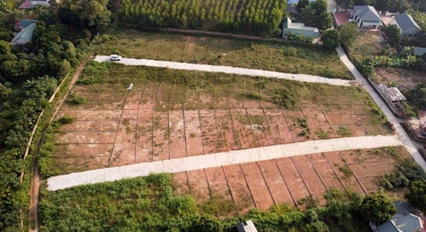 Việc siết phân lô, tách thửa để cảnh tỉnh để người dân không có tâm lý đi thu gom, mua đất nhỏ lẻ mà không quan tâm đến quy hoạch. (Nguồn: TTXVN) Hà Nội: Bất động sản ven đô trầm lắng sau lệnh tạm dừng phân lô ảnh 1