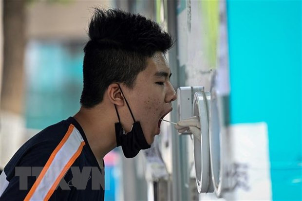 Trung Quốc: Macau tái áp dụng xét nghiệm COVID-19 đại trà ảnh 1