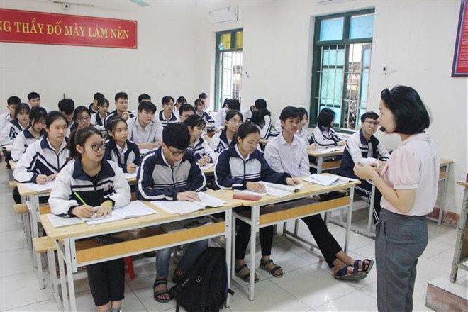 Giờ ôn luyện của học sinh khối 12, trường THPT Yên Lạc, tỉnh Vĩnh Phúc. (Ảnh: Nguyễn Thảo/TTXVN) Tạo điều kiện thuận lợi nhất cho các thí sinh dự thi tốt nghiệp THPT ảnh 1