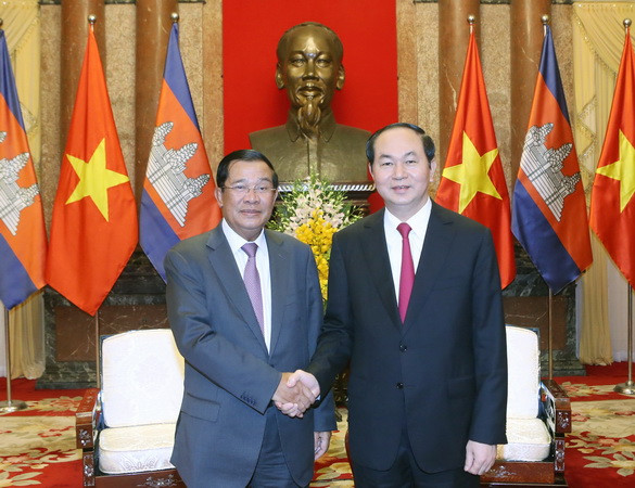 Chủ tịch nước Trần Đại Quang tiếp Samdech Techo Hun Sen, Thủ tướng Vương quốc Campuchia nhân chuyến thăm chính thức Việt Nam. (Ảnh: Nhan Sáng/TTXVN) Thúc đẩy mạnh mẽ quan hệ hữu nghị tốt đẹp Việt Nam-Campuchia ảnh 1