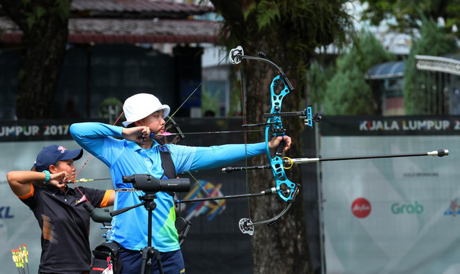 Bắn cung mang về huy chương đầu tiên cho đoàn Việt Nam ở SEA Games ảnh 1