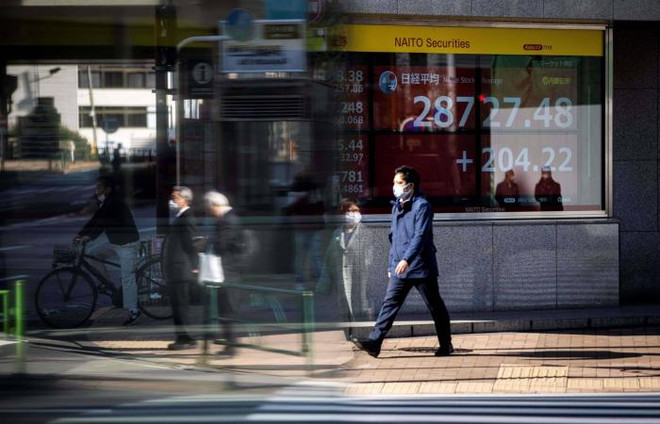 Chỉ số Topix của Nhật Bản tăng cao nhất trong 31 năm qua ảnh 1