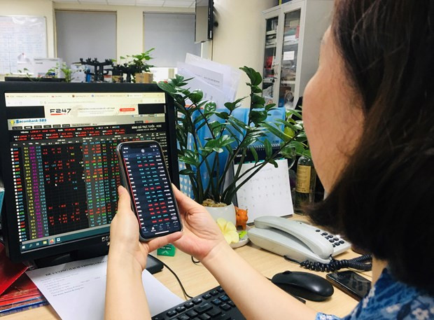 Lực bán dâng cao, VN-Index giảm về gần mốc 1.200 điểm ảnh 1