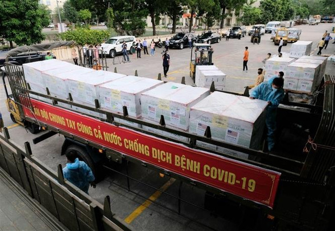 Nhìn lại 1 năm vượt "bão COVID-19" - Sức khỏe nhân dân là trên hết ảnh 2