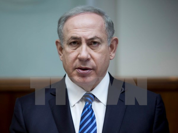 Thủ tướng Israel Benjamin Netanyahu tại cuộc họp nội các hàng tuần ở thủ đô Jerusalem ngày 11/12. EPA/TTXVN Thủ tướng Israel Benjamin Netanyahu bị điều tra hình sự ảnh 1