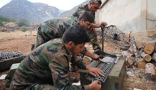 Các tay súng Hezbollah tại một cứ điểm quân sự ở khu vực biên giới Liban-Syria. (Nguồn: alalam.ir) Hezbollah đe dọa tấn công công các vị trí của Mỹ ở Syria ảnh 1