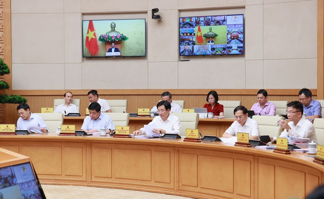 Các Bộ trưởng và đại diện các cơ quan thuộc Chính phủ tham dự Phiên họp Chính phủ thường kỳ tháng 5. (Ảnh: Dương Giang/TTXVN) Thủ tướng Phạm Minh Chính: Tập trung ưu tiên cho thúc đẩy tăng trưởng ảnh 2