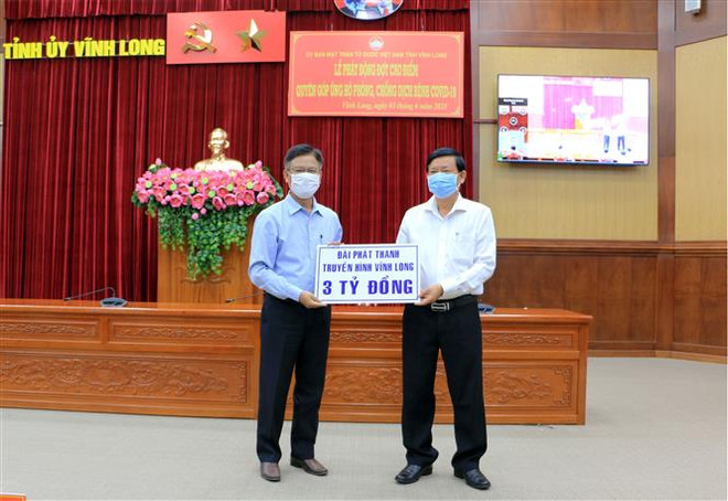 Vĩnh Long, Bình Dương huy động các nguồn lực phòng, chống COVID-19 ảnh 1