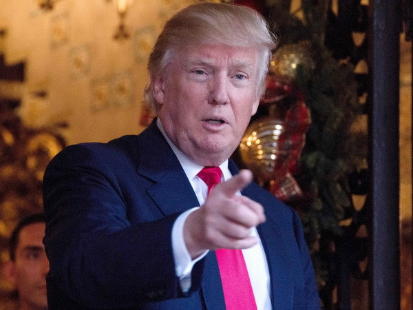 Tổng thống đắc cử Mỹ Donald Trump tại một sự kiện ở Palm Beach, bang Florida ngày 21/12. (Nguồn: AFP/TTXVN) Mỹ: Ông Trump sẽ loại bỏ nhiều di sản của Tổng thống Obama ảnh 1