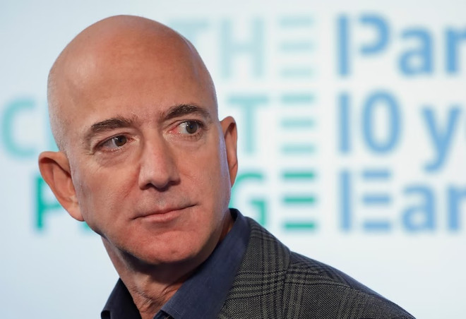 Doanh nhân Jeff Bezos. (Nguồn: AP) Những 'chú Mèo vàng' nổi tiếng và tài hoa của thế giới ảnh 2