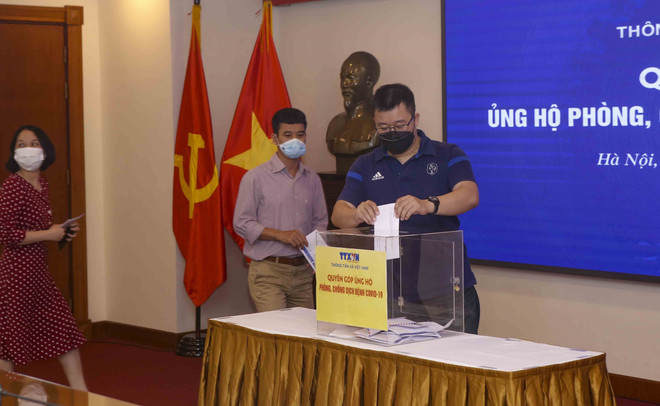 [Photo] TTXVN quyên góp ủng hộ phòng, chống dịch COVID-19 ảnh 1