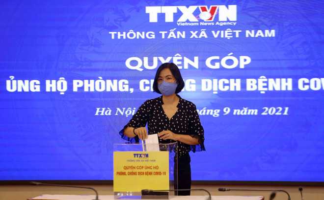 [Photo] TTXVN quyên góp ủng hộ phòng, chống dịch COVID-19 ảnh 3