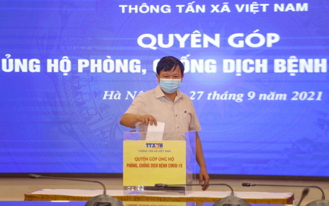 [Photo] TTXVN quyên góp ủng hộ phòng, chống dịch COVID-19 ảnh 4