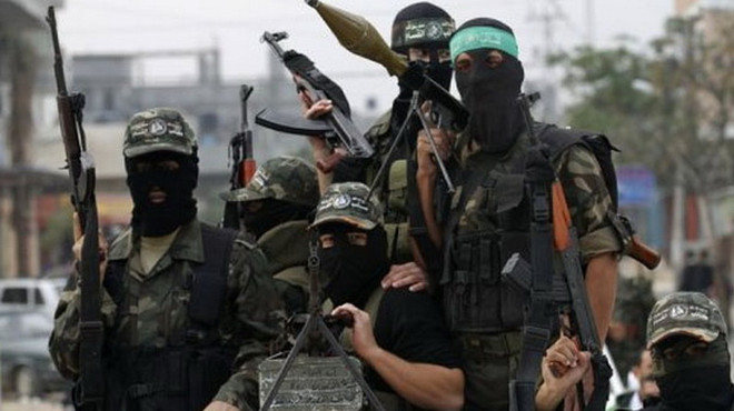 Các tay súng thuộc phong trào Hamas. (Nguồn: AFP0 Phong trào Hamas tổ chức diễu binh, thề sẽ hủy diệt Israel ảnh 1