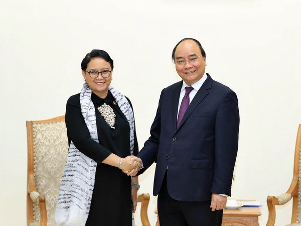 Thủ tướng Nguyễn Xuân Phúc tiếp Bộ trưởng Ngoại giao Indonesia Retno Marsudi, đồng chủ trì Kỳ họp lần thứ ba Ủy ban Hợp tác song phương cấp Bộ trưởng ngoại giao Việt Nam-Indonesia. (Ảnh: Thống Nhất/TTXVN) Thủ tướng Nguyễn Xuân Phúc tiếp Bộ trưởng Ngoại giao Indonesia ảnh 1