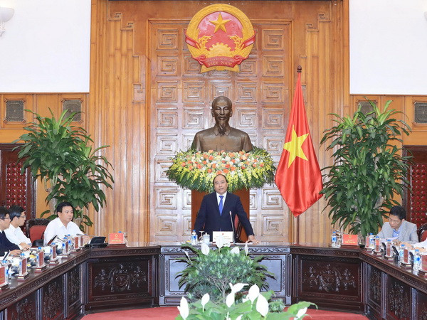 Thủ tướng Nguyễn Xuân Phúc phát biểu tại buổi làm việc. (Ảnh: Thống Nhất/TTXVN) Tổ tư vấn của Thủ tướng dự báo triển vọng kinh tế 2018-2020 ảnh 1