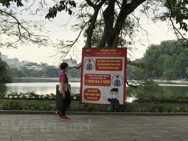 (Ảnh: Đức Duy/Vietnam+) Bảo đảm an toàn phòng dịch COVID-19 trong ngày bầu cử Quốc hội ảnh 2