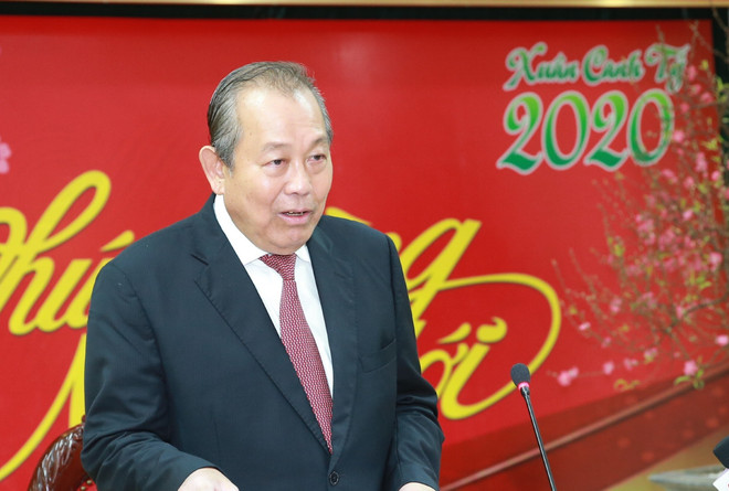 Phó Thủ tướng Thường trực Chính phủ Trương Hòa Bình. (Ảnh: Doãn Tấn/TTXVN) Phó Thủ tướng gặp gỡ kiều bào tại Thụy Sĩ nhân dịp Tết cộng đồng ảnh 1
