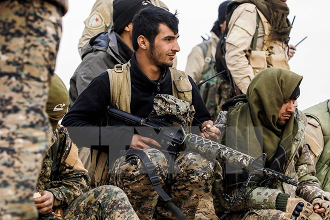 Chiến binh người Kurd. Ảnh minh họa. (Nguồn: AFP/TTXVN) Thổ Nhĩ Kỳ phản đối cuộc trưng cầu dân ý đòi độc lập của người Kurd ảnh 1