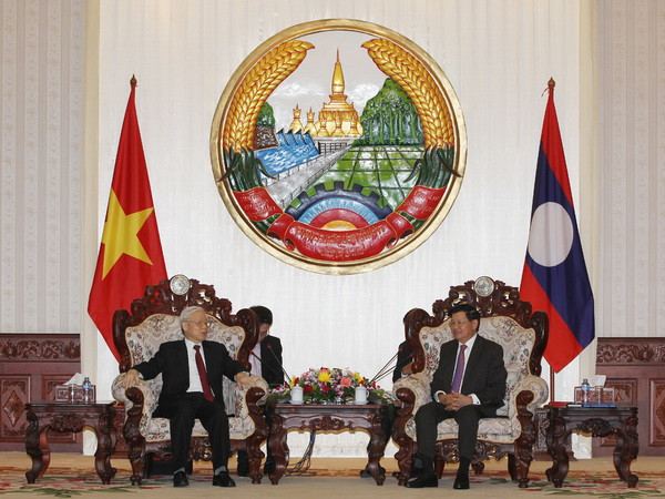 Tổng Bí thư hội kiến Thủ tướng Lào Thongloun Sisoulith ảnh 1
