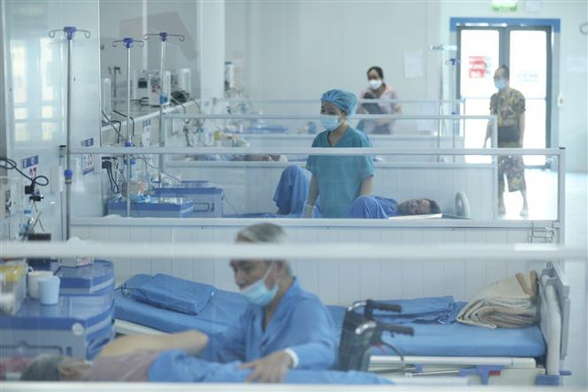Bệnh nhân nhập viện vì COVID-19 tại Hà Nội. (Ảnh: Minh Quyết/TTXVN) Ngày 29/5: Ghi nhận 846 ca mắc mới COVID-19, không có ca tử vong ảnh 1