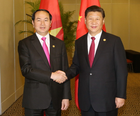 Chủ tịch nước Trần Đại Quang gặp Chủ tịch nước Trung Quốc Tập Cận Bình. (Ảnh: Nhan Sáng/TTXVN) Hoạt động song phương của Chủ tịch nước Trần Đại Quang tại Peru ảnh 2