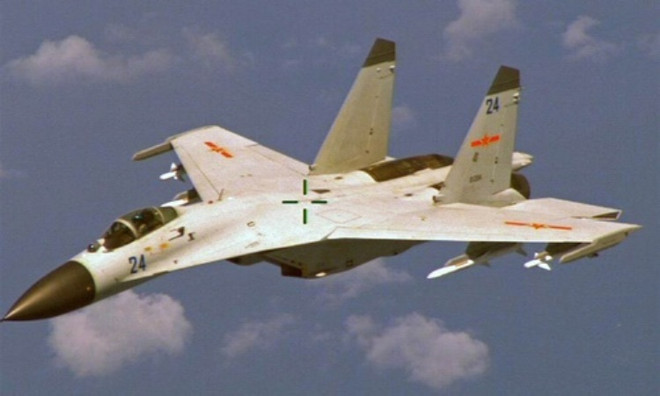 Máy bay tiêm kích J-11 của Trung Quốc. (Nguồn: Reuters) Nhật Bản phòng vệ các tiêm kích Trung Quốc ở Thái Bình Dương ảnh 1