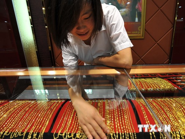 Giá vàng tăng cao vì tình hình căng thẳng vụ rơi máy bay MH17 ảnh 1