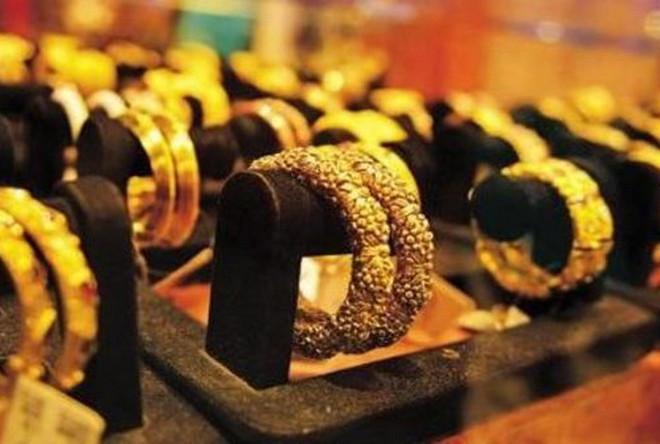 Giá vàng giảm nhẹ trong bối cảnh nhà đầu tư chờ dấu hiệu Fed ảnh 1