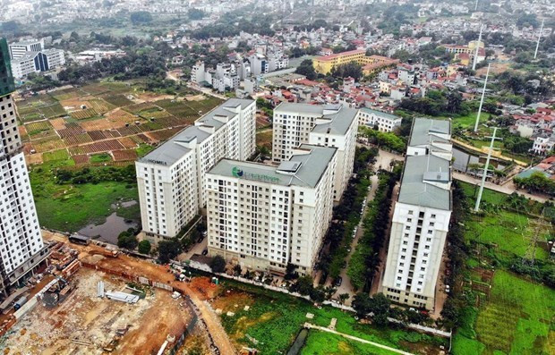 Ảnh minh họa. (Nguồn: TTXVN) Thị trường bất động sản Việt Nam vẫn duy trì sức hấp dẫn ảnh 1