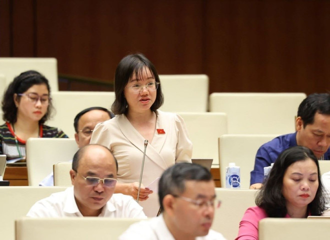 Đại biểu Quốc hội tỉnh Nghệ An Thái Thị An Chung phát biểu. (Ảnh: Văn Điệp/TTXVN) ttxvn_thao_luan_ve_du_kien_chuong_trinh_xay_dung_luat_phap_lenh_3005-2.jpg