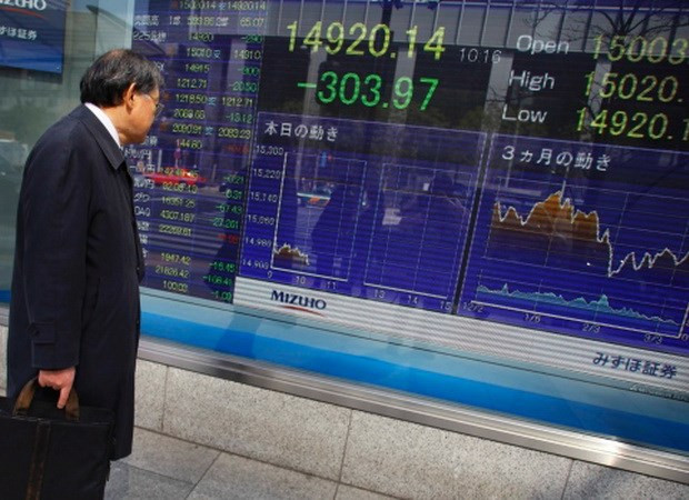 Chứng khoán châu Á tiếp tục trượt dốc, xuống mức thấp nhất 4 năm ảnh 1