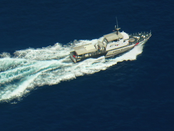 Phân tích mẫu dầu loang nghi của máy bay Malaysia mất tích ảnh 1