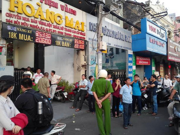 Vụ tiệm vàng Hoàng Mai: Công an đã trả lại 14.000 USD ảnh 1