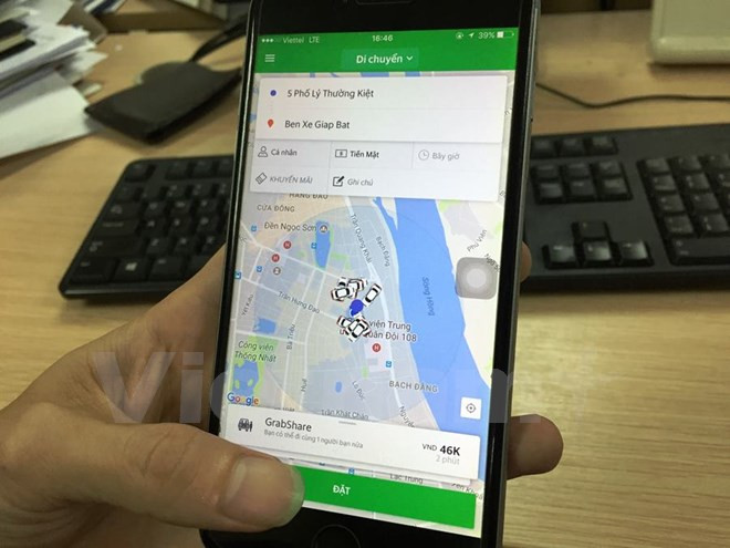 Dừng dịch vụ đi chung xe của taxi Uber, Grab tại thủ đô Hà Nội ảnh 1