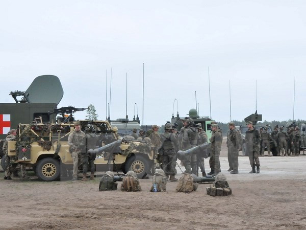 Ngoại trưởng Đức kêu gọi NATO không "khua gươm" với Nga ảnh 1