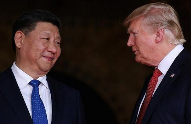 Tổng thống Mỹ Donald Trump và Chủ tịch Trung Quốc Tập Cận Bình. (Nguồn: CNBC.com) Trung Quốc sẽ 'chiến đấu' nếu Mỹ leo thang tranh cãi thương mại ảnh 1