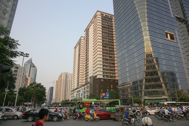 Ảnh minh họa. (Nguồn: TTXVN) Cổ phiếu bất động sản vẫn có nhiều tiềm năng trong trung và dài hạn ảnh 1