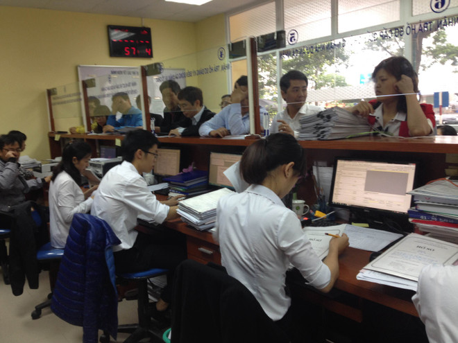 Hà Nội yêu cầu xử lý nghiêm chủ đầu tư thu phí cấp sổ đỏ trái quy định ảnh 1