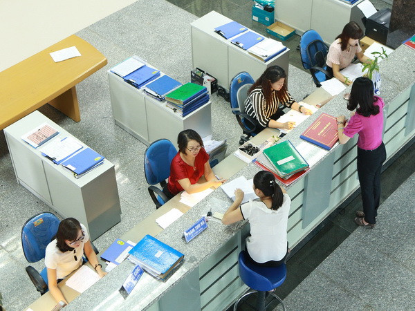 (Ảnh minh họa: Hoàng Hùng/TTXVN) Hợp tác quốc tế là chìa khóa đẩy lùi tình trạng trốn thuế ảnh 1