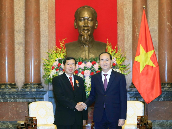 Chủ tịch nước Trần Đại Quang tiếp Chánh án Tòa án nhân dân tối cao Lào ảnh 1
