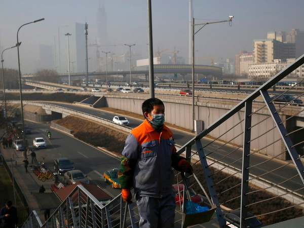 Trung Quốc lần đầu tiên cảnh báo "đỏ" về ô nhiễm không khí ảnh 1