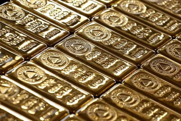 Giá vàng thế giới đi lên trước đồn đoán Fed nới lỏng tiền tệ ảnh 1