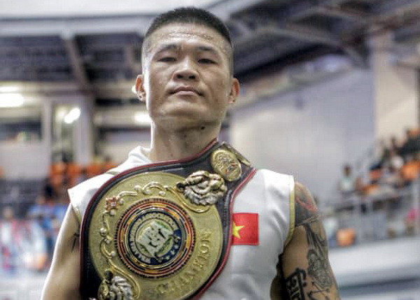 Võ sỹ Trương Đình Hoàng. Hạ knock-out võ sỹ Thái Lan, Đình Hoàng giành đai WBA châu Á ảnh 1